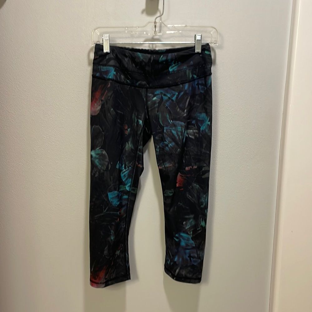 Lucy woman’s black Capri with a jungle theme